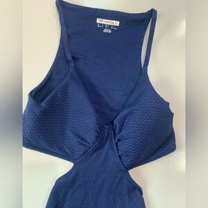 Navy Blue Full- cut out body suit woman’s size L ribbed design. Yoga, Excercise